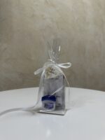 Dovanėlė klientui: mėginukas + lūpų balzamas + pakabukas